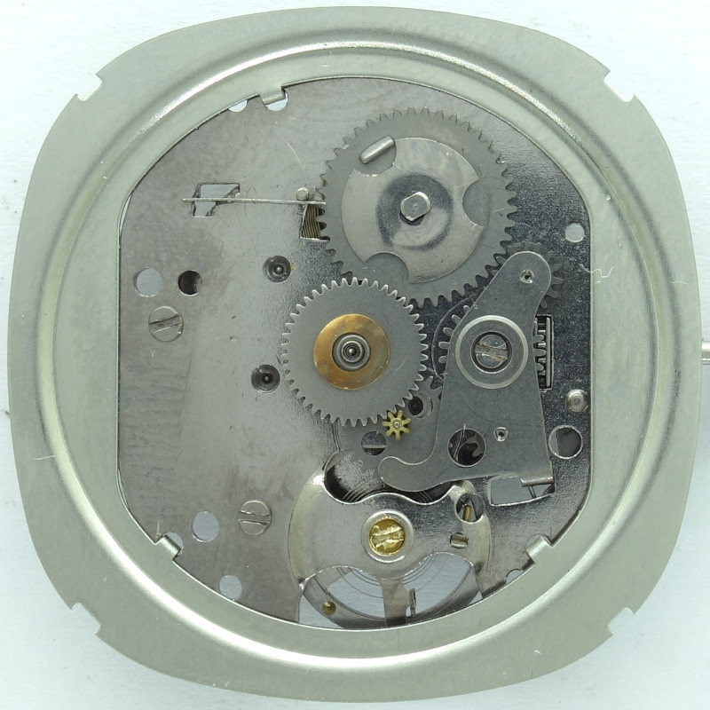 dial side with movement holder and dial attachment preparations Timex M116: dial side with movement holder and dial attachment preparations