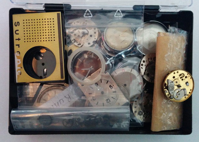 a box full of Ruhla parts